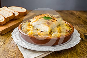 Bacalhau ÃÂ  BrÃÂ¡s: Traditional Portuguese Dish with Cod, Potatoes, and Eggs photo